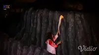 Susy Susanti menyalakan api abadi Asian Games 2018. (vidio.com)