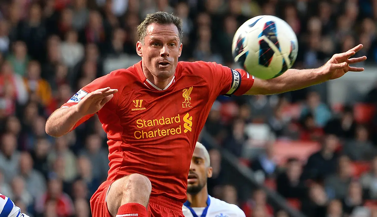 6. Jamie Carragher (Liverpool) - Bek asal Inggris ini memang layak menjadi salah satu Legenda Liverpool. Jamie Carragher menghabiskan seluruh karier sepak bolanya di Liverpool, mulai dari pendidikan akademi hingga ia pensiun pada 2013 silam. (AFP/Paul Ellis)