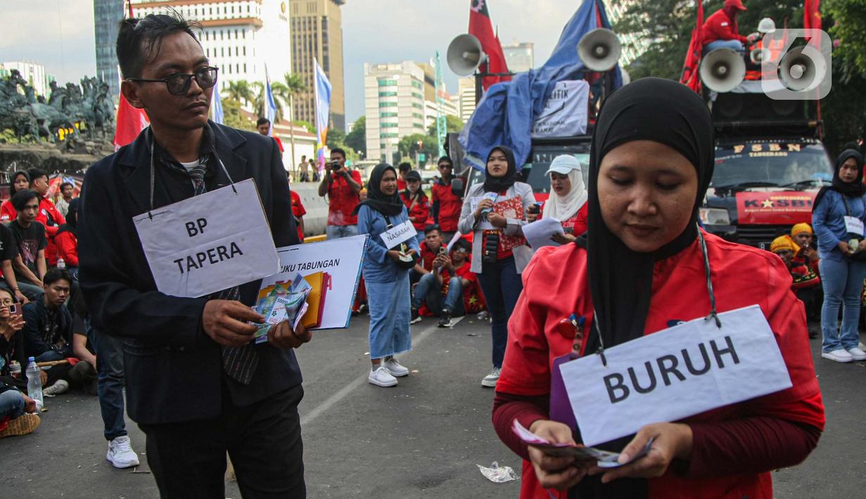 Pengunjuk rasa mendesak pemerintah membatalkan program Tabungan Perumahan Rakyat (Tapera). (Liputan6.com/Angga Yuniar)