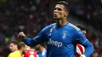 Striker Juventus, Cristiano Ronaldo, saat melawan Atletico Madrid pada laga Liga Champions di Stadion Wanda Metropolitano, Rabu (18/9/2019). Kedua tim bermain imbang 2-2. (AP/Cristiano Ronaldo)