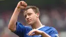 4. John Terry, debut bek legendaris Chelsea ini bersama tim senior adalah ketika dilatih oleh Claudio Ranieri. Dirinya mempersembahkan Chelsea banyak gelar antara lain, 4  Liga Premier Inggris, 6 Piala FA dan sebuah Liga Champions. (AFP/Paul Barker)