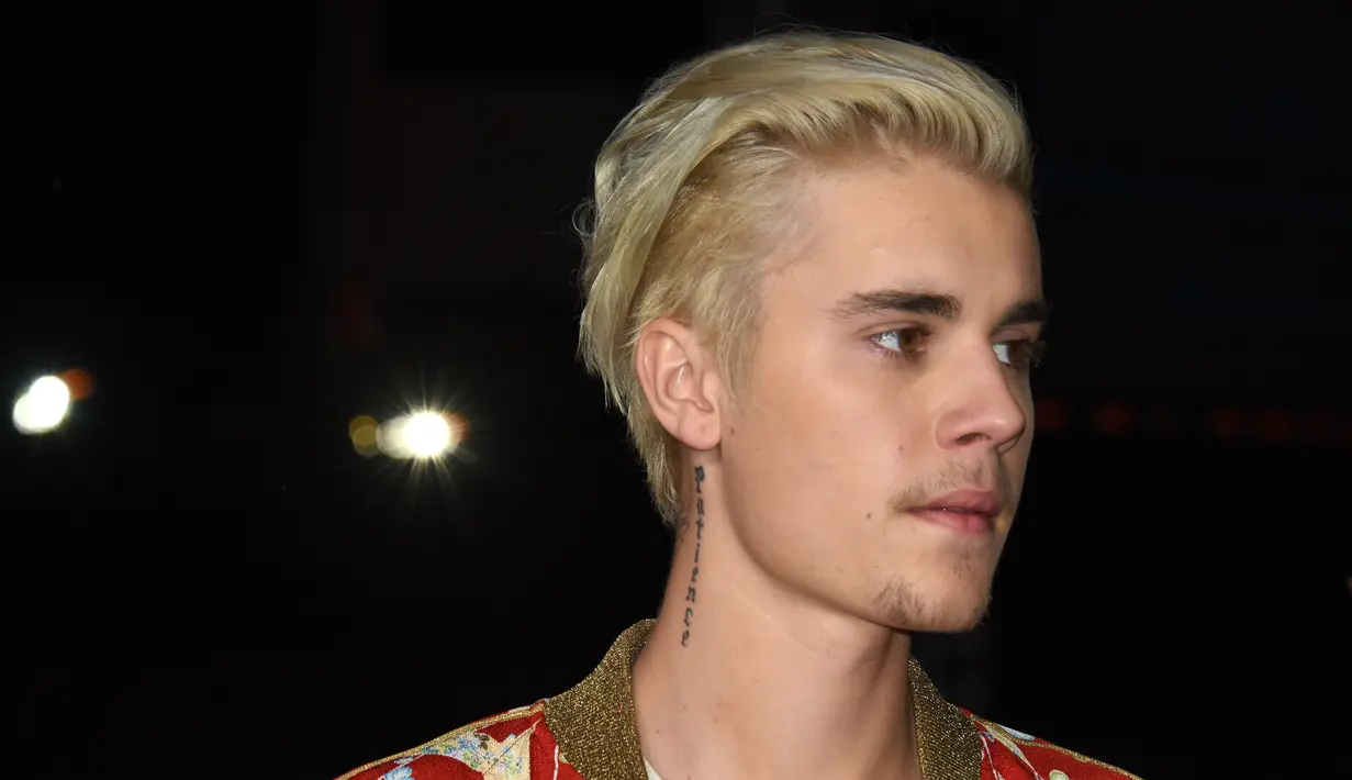 Kabar mengejutkan datang dari Justin Bieber, penyanyi asal Kanada ini memboyong pacar baru saat dirinya berlibur ke Jepang. (AFP/Bintang.com)