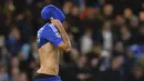 Pemain Chelsea, Diego Costa menutup muka stelah berduel dengan pemain Porto, Danilo pada lanjutan Liga Champions leg kedua grup G di Stadion Stamford Bridge, London, Kamis (10/12/2015) dini hari WIB.  (AFP Photo/Glyn Kirk)