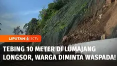 Tebing setinggi 10 meter di wilayah Lumajang, Jawa Timur, longsor, akibatnya batu besar dan tanah berserakan di jalan.