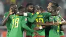 Tuan rumah Kamerun juga berhasil memastikan satu tiket perempat final Piala Afrika 2021 setelah menang 2-1 atas Kepulauan Comoros. Kemenangan ini membuat Kamerun akan bersua Gambia dilaga selajutnya. (AP/Themba Hadebe)