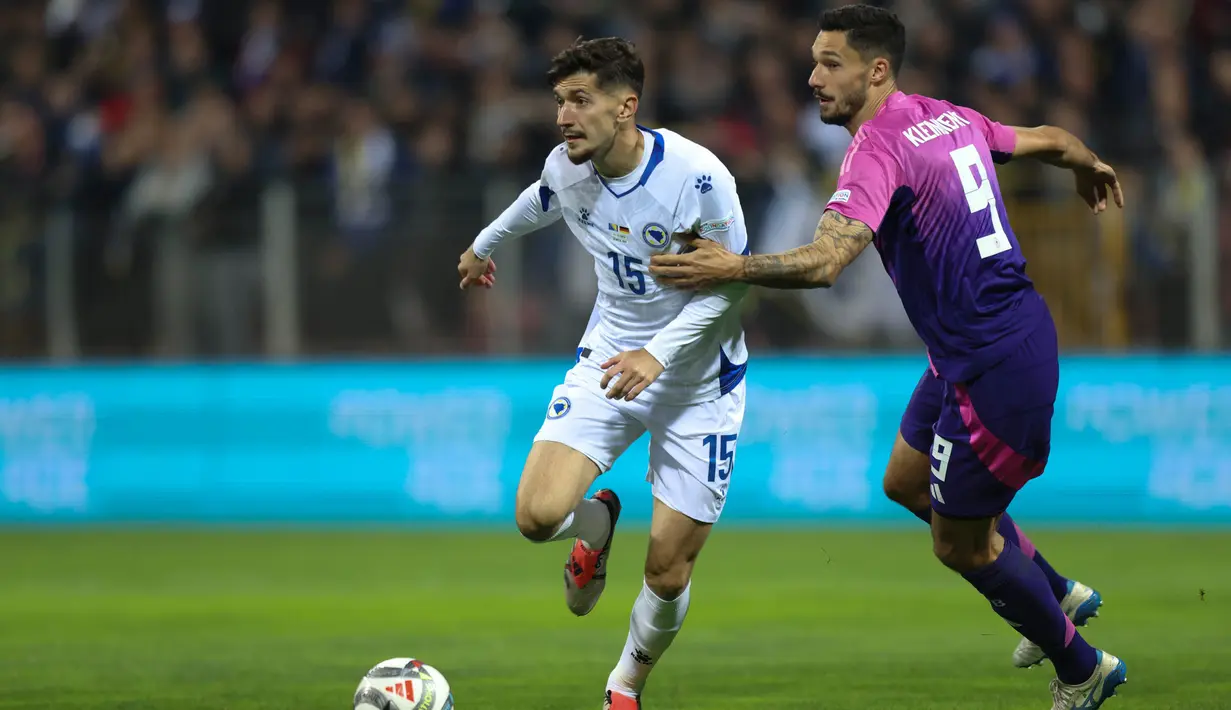 Kemenangan ini membuat posisi Jerman di puncak klasemen Grup 3 dengan 7 poin dari tiga pertandingan belum tergoyahkan. Sementara, Bosnia terpuruk di dasar klasemen. (AP Photo/Armin Durgut)