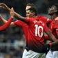 Para pemain Manchester United merayakan gol yang dicetak Marcus Rashford ke gawang Newcastle pada laga Premier League di Stadion St James Park, Newcastle, Rabu (2/1). Newcastle kalah 0-2 dari MU. (AFP/Lindsey Parnaby)