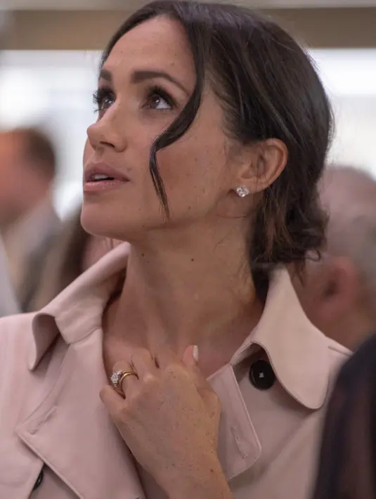 Meghan Markle sendiri menjadikan perjalanan ini sebagai sesuatu yang serius karena menyangkut pekerjaan. (ARTHUR EDWARDS / AFP)