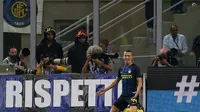 Gelandang Inter Milan, Ivan Perisic melakukan selebrasi usai menjebol gawang Bologna, pada laga lanjutan Serie A 2016-2017, di Stadion Giuseppe Meazza, Milano, Minggu (25/9/2016).  (Reuters/Stefano Rellandini)