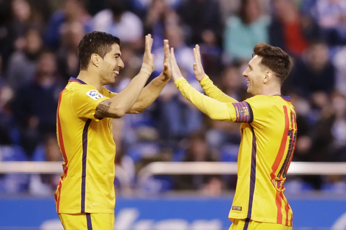 Lionel Messi dan Luis Suarez