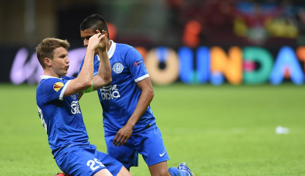 Ekspresi Sultan Rotan setelah menjebol gawang Sevilla.  AFP PHOTO/PIOTR HAWALEJ)