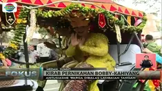 Kahiyang-Bobby dieluk-elukkan warga yang berdiri di sepanjang jalan sejauh lebih dari 2 kilometer.