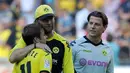 Kebersamaan keduanya dan pemain Dortmund lainnya sukses menghentikan hegemoni Bayern Munchen di Bundesliga. (AFP/Patrik Stollarz) 