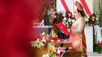 Ketua DPR, Puan Maharani membacakan teks proklamasi saat upacara peringatan HUT ke-76 RI di Istana Merdeka, Selasa (17/8/2021).  Pada tahun ini, upacara dihadiri oleh undangan terbatas yang terlibat dalam rangkaian upacara peringatan. (Foto:Muchlis Jr-Biro Pres Sekretariat Presiden)