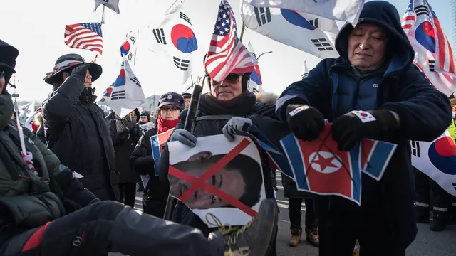 Rombongan Seni Korea Utara Disambut Demo Jelang Tampil di Pyeongchang