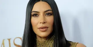 Kim Kardashian menginginkan anak ketiga. Waktunya lahir sudah dekat, rahim penggantinya pun itu bisa melahirkan kapapun. (CHRIS DELMAS  AFP)