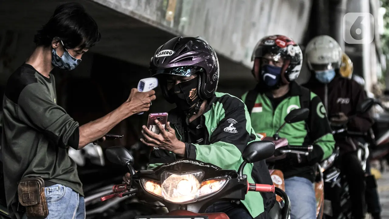 Pemeriksaan Kesehatan Rutin Pengojek Daring di Masa Pandemi