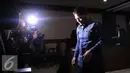 Terdakwa kasus suap perkara hukum yang juga Panitera Pengadilan Negeri Jakarta Utara Rohadi meninggalkan ruangan usai menjalani sidang dengan agenda pembacaan dakwaan di Pengadilan Tipikor, Jakarta, Senin (5/9). (Liputan6.com/Helmi Afandi)