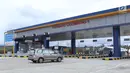 Kendaraan melintas masuk gerbang tol Cigombong I di Cigombong, Kab Bogor, Jawa Barat, usai diresmikan, Sabtu (1/12). Ruas panjang tol Ciawi-Sukabumi Seksi I Ciawi-Cigombongsejauh 15,3 kilometer. (Liputan6.com/Helmi Fithriansyah)