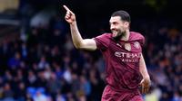 Pemain Manchester City, Mateo Kovacic merayakan golnya ke gawang Everton dalam laga lanjutan Liga Inggris 2024/2025 di Goodison Park, Liverpool, Inggris, Sabtu (19/04/2025) waktu setempat. (AP Photo/Peter Byrne)