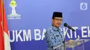 Walikota Jakarta Barat Yani Wahyu Purwoko memberi sambutan pada Webinar UKM Bangkit, Ekonomi Tumbuh di kantor Walikota Jakarta Barat, Senin (29/11/2021). Bantuan berupa dana banjir dan mesin jahit sebagai bentuk akselerasi dan kolaborasi untuk bangkit di masa pandemi. (Liputan6.com/HO/HIPMI Jaya)