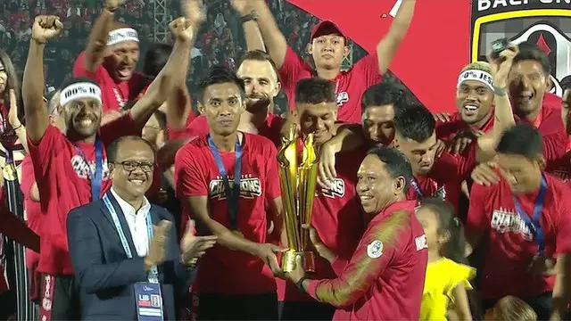 Berita video momen selebrasi Bali United menjadi juara Shopee Liga 1 2019 setelah pertandingan melawan Madura United pada pekan terakhir, Minggu (22/12/2019).