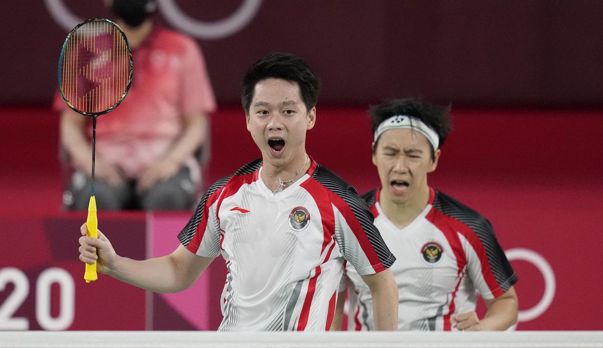 Pasangan ganda putra Indonesia, Marcus Gideon dan Kevin Sanjaya berhasil memenangkan pertandingan kedua mereka ketika menghadapi pasangan India, Rankireddy Satwiksairaj dan Shetty Chirag. The Minions mampu memenangkan dua gim langsung. (Foto: AP/Markus Schreiber)