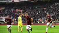 Andre Silva mencetak gol penentu kemenangan AC Milan atas Chievo dalam lanjutan Liga Serie Italia di Stadion San Siro, Minggu (18/3/2018) malam WIB. AC Milan menang 3-2. (MIGUEL MEDINA / AFP)