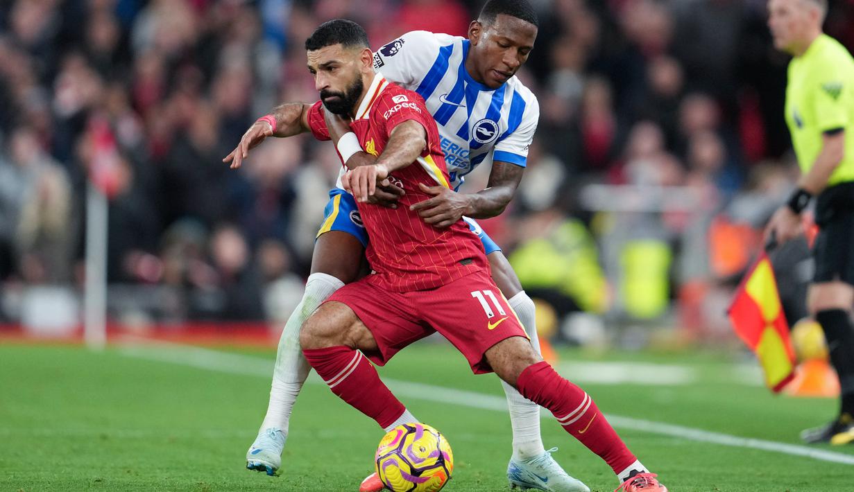 Mohamed Salah sekali lagi menunjukkan dirinya sebagai penyelamat sekaligus pemain penentu bagi Liverpool. Golnya ke gawang Brighton & Hove Albion adalah bukti terbaru. (AP Photo/Jon Super)