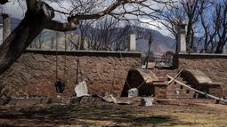 Kebakaran tersebut menewaskan sedikitnya 97 orang dan menghancurkan lebih dari 2.000 bangunan, sebagian besar adalah rumah. (AP Photo/Mengshin Lin)