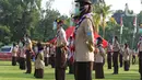 Anggota Pramuka mengikuti apel di Taman Rekreasi Wiladatika, Cibubur, Jakarta, Rabu (28/10/2020). Apel Kesiapsiagaan Relawan Pramuka Peduli untuk meningkatkan peran serta gerakan pramuka dalam upaya menanggulangi bencana alam. (Liputan6.com/Herman Zakharia)