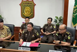Direktur Penyidikan Jampidsus Kejagung Kuntadi saat jumpa pers di Kejagung, Jakarta Selatan, Senin (19/2/2024). (Liputan6.com/Nanda Perdana Putra).