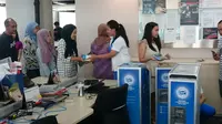 Frisian Flag menyambangi kantor Liputan6.com untuk membagikan 75 box sarapan sempurna