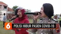 Sejumlah polisi di Tegal, Jawa Tengah, menggelar orkes tunggal di halaman Rusunawa Isolasi Covid-19, Minggu sore (13/6). Kegiatan ini sengaja digelar untuk menghibur pasien Covid-19 yang sedang menjalani isolasi, dengan harapan imunitas para pasien m...