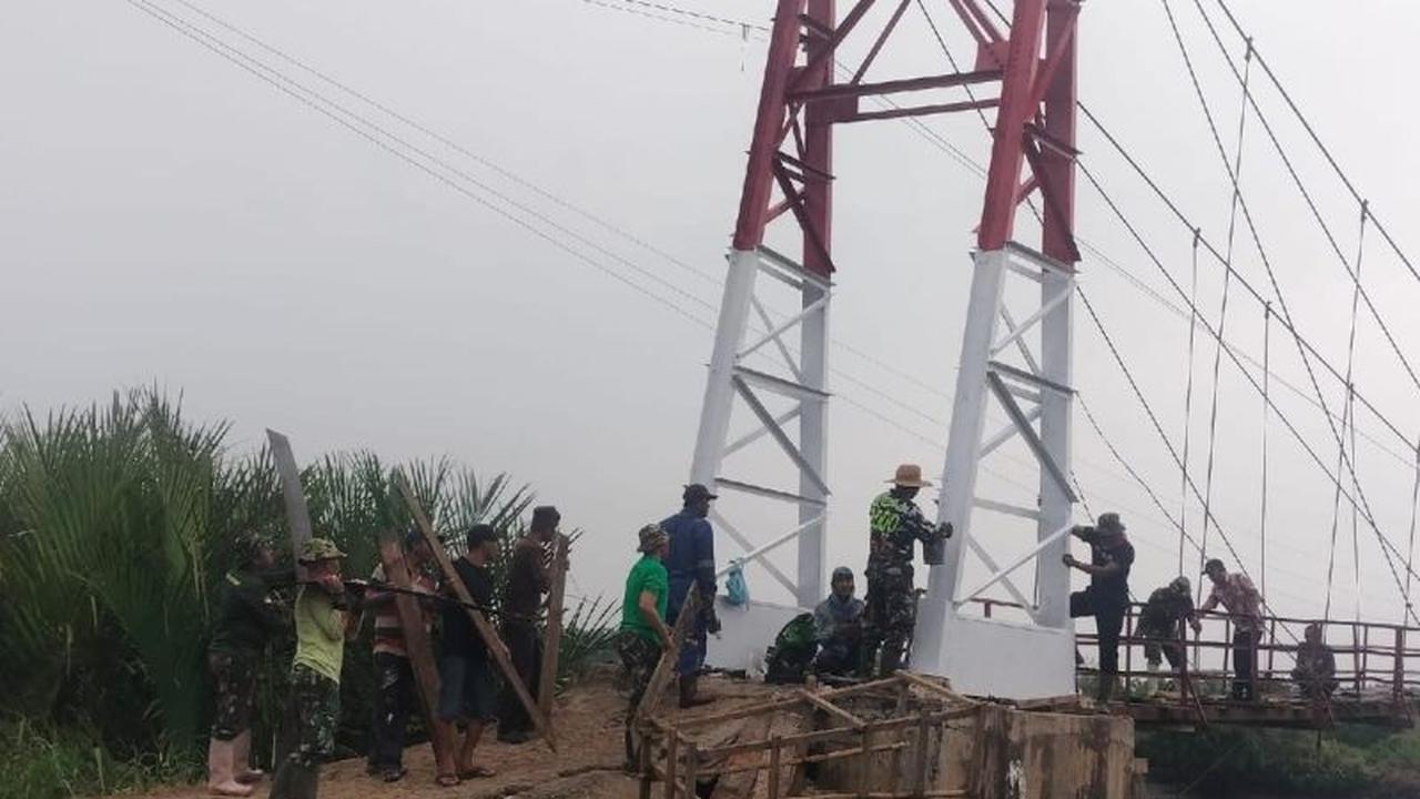 TNI Selesaikan Pembangunan Jembatan Gantung Langkat, Mobilitas Warga Gebang Makin Lancar