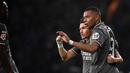 Tampil dominan, Real Madrid membuka gol kemenangan pada menit ke-20 lewat tendangan keras terarah dari pemain depan Kylian Mbappe. (MIGUEL RIOPA/AFP)