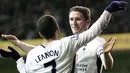 Tottenham Hotspur&#039;s Aaron Lennon and Robbie Keane celebrate after Lennon scored the fourth goal against Middlebrough during Premiership match at White Hart Lane on March 4, 2009. AFP PHOTO/Carl de Souza