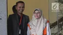 Hakim PN Tangerang Wahyu Widya Nurfitri bersiap meninggalkan gedung KPK usai menandatangani berkas P21, Jakarta, Jumat (11/5). Widya dapat secepatnya menjalani sidang terkait dalam kasus dugaan suap. (Merdeka.com/Dwi Narwoko)