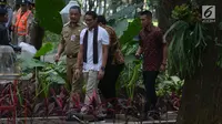 Wakil Gubernur DKI Jakarta Sandiaga Uno menghadiri garden party dan peresmian taman di Monumen Nasional (Monas) bagian barat, Selasa (27/3). Sandiaga mengatakan bahwa nama taman yang baru diresmikan itu belum diputuskan. (Merdeka.com/Imam Buhori)