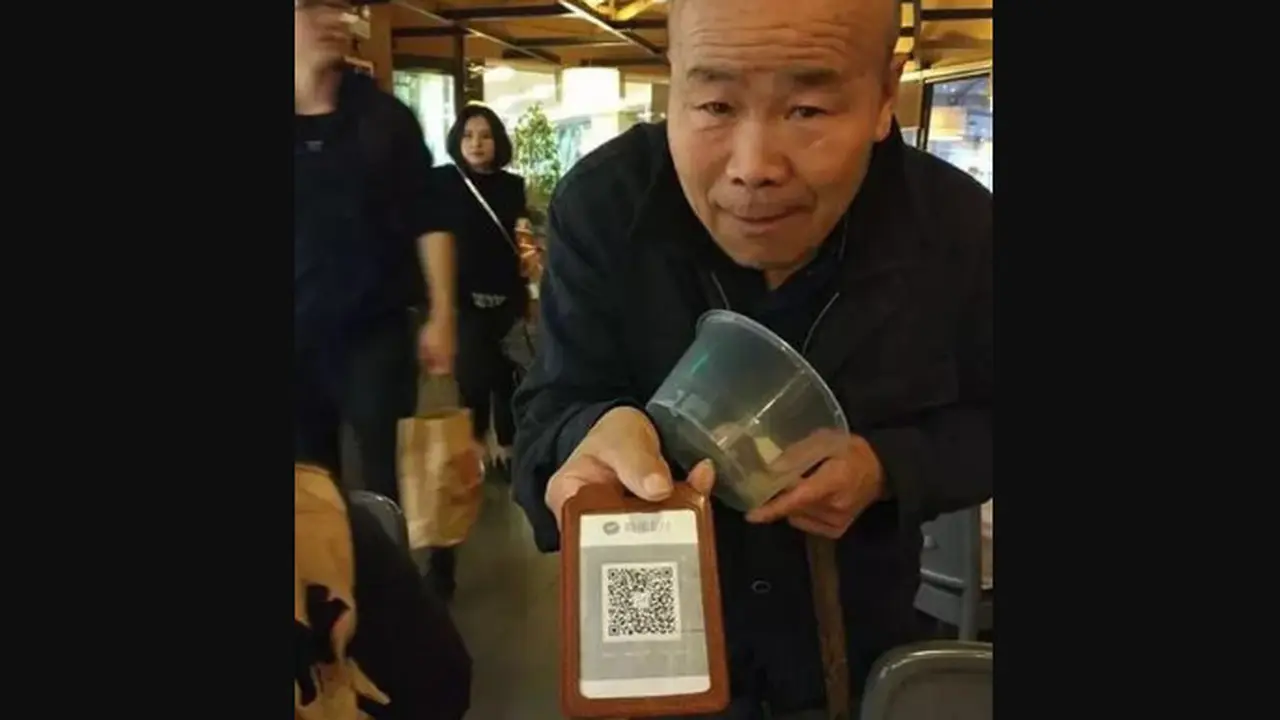 Pengemis di Tiongkok Kini Bisa Terima Uang Dengan Kode QR