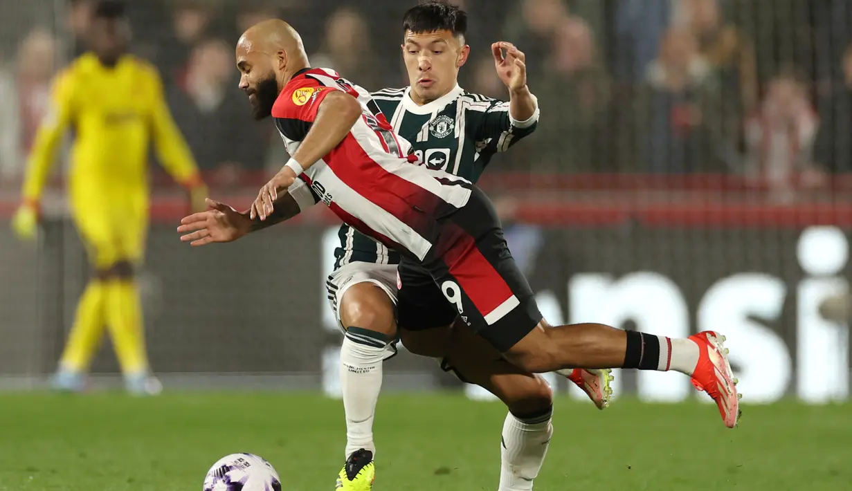 Manchester United unggul lebih dulu setelah Mason Mount berhasil mencetak gol di menit tambahan waktu (90+6). (AP Photo/Ian Walton)