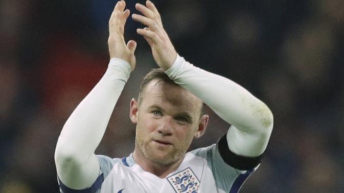 Wayne Rooney ketika masih membela Timnas Inggris. Ia kini bermain untuk DC United. (AP/Matt Dunham/File)