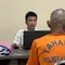 J (37), pelaku pencabulan anak kandungnya sendiri saat dimintai keterangan pihak kepolisian. (Liputan6.com/ Dok Humas Polres Karawang)
