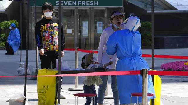 FOTO: China Tetap Terapkan Aturan Ketat 'Nol COVID'