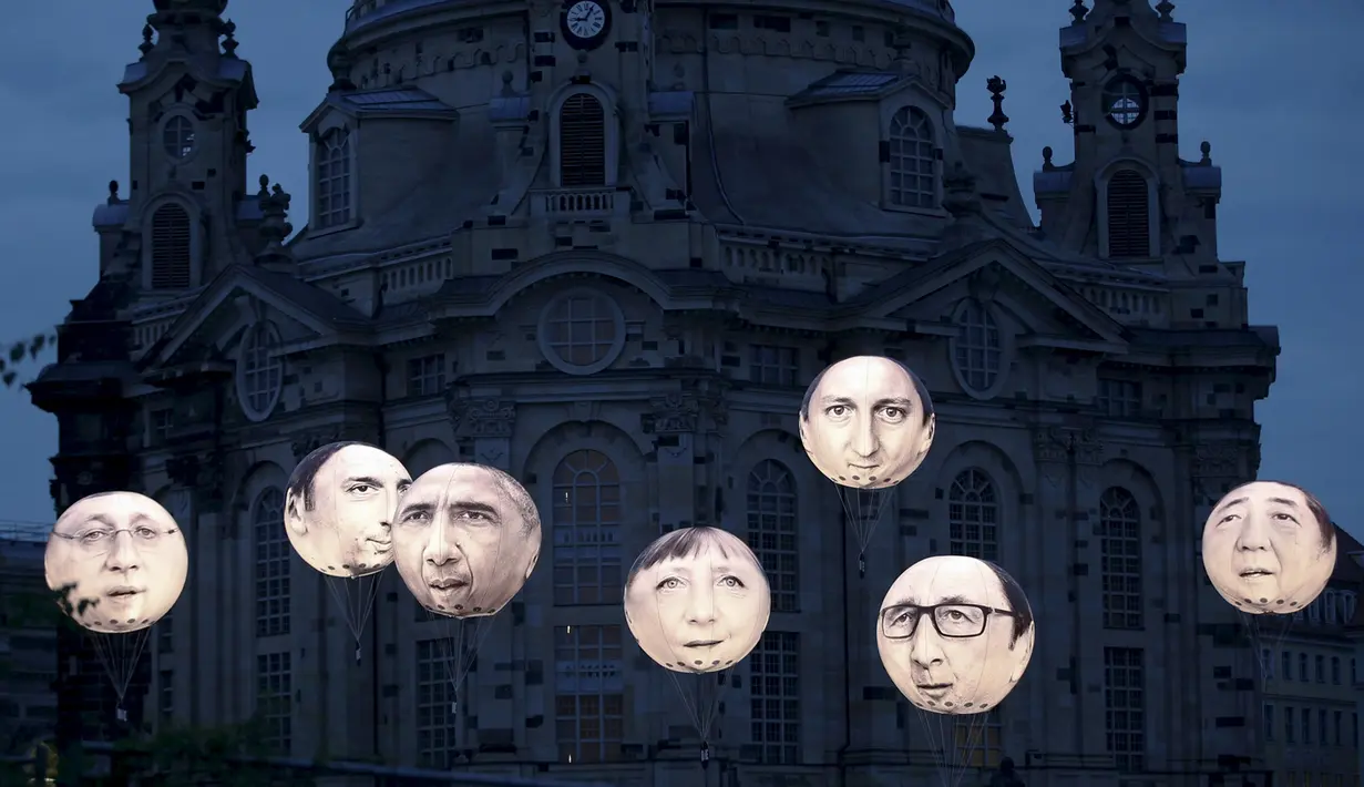 Balon yang menggambarkan wajah pemimpin negara anggota G7 menghiasi kota Dresden, Jerman, (27/5/2015). Kanselir Jerman Angela Merkel mengatakan, tak terbayangkan bila Rusia berpartisipasi dalam pertemuan G7. (REUTERS/Fabrizio Bensch)