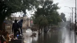 Sejumlah kota dan wilayah pedesaan di Rio Grande do Sul dilanda hujan lebat dan banjir besar yang belum pernah terjadi sebelumnya. (Anselmo Cunha/AFP)