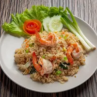 ilustrasi nasi goreng kecombrang dengan topping udang/copyright freepik.com/jcomp