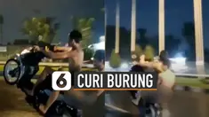 Dua remaja itu dengan santainya melakukan jumping motor di tengah jalan dan saat hujan.