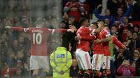 Para pemain Manchester United saat merayakan gol Jesse Lingard ke gawang West Bromwich Albion, pada laga lanjutan Premier League, di Old Trafford, Sabtu (7/11/2015). (AFP/ Oli Scarff)