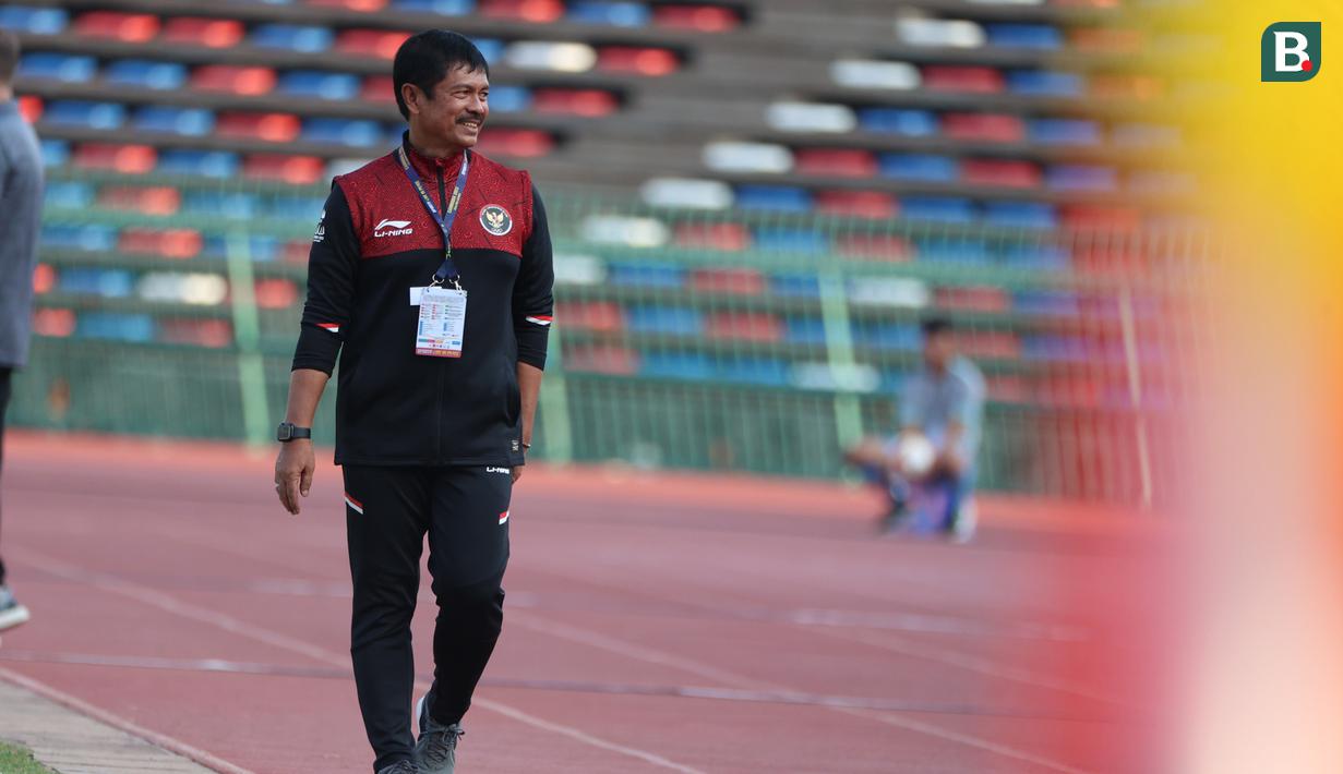 <p>Pelatih kepala Timnas Indonesia U-22, Indra Sjafri saat laga kedua Grup A SEA Games 2023 menghadapi Myanmar di Olympic Stadium, Phnom Penh, Kamboja, Kamis (4/5/2023). (Bola.com/Abdul Aziz)</p>